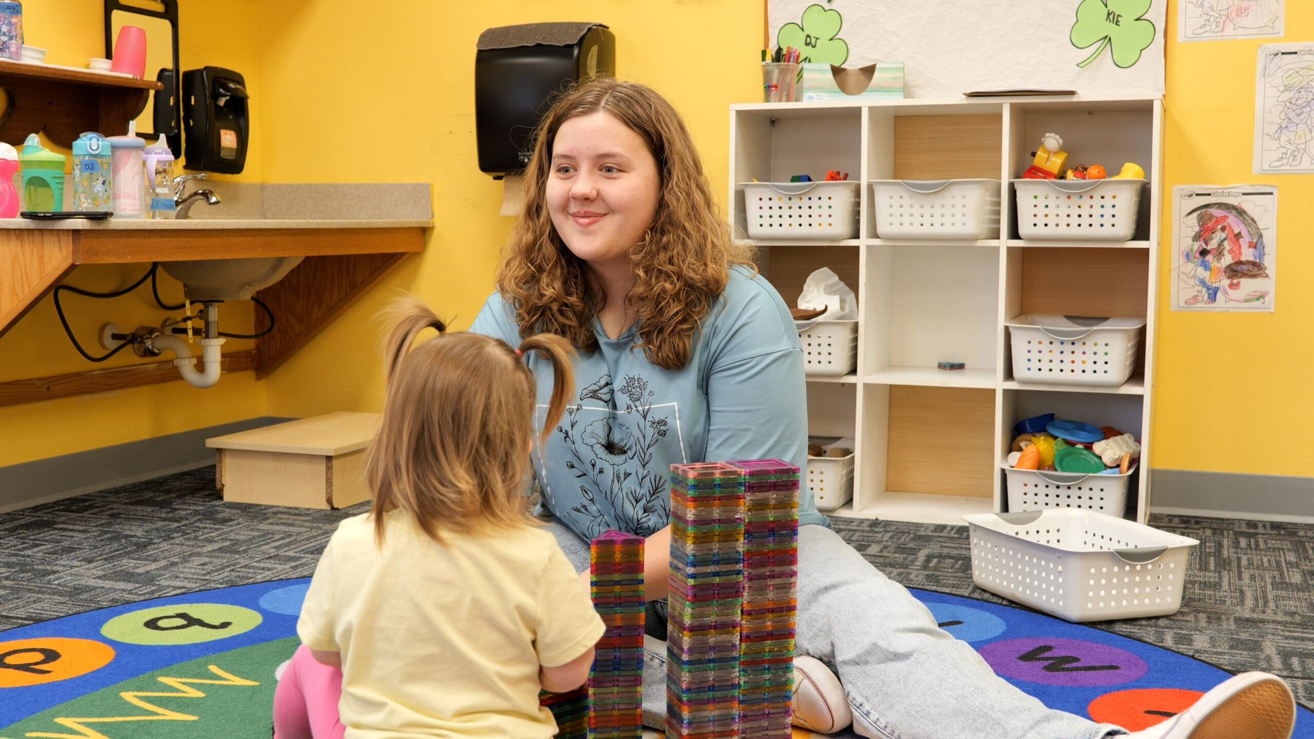 daycare worker smiling